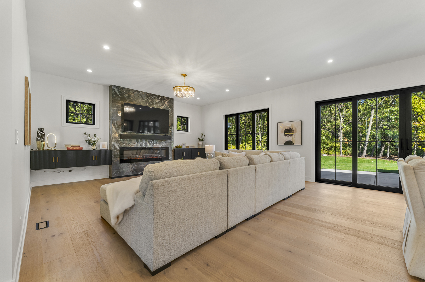 1504 Linden Circle Lemont, IL 60439 - Photo 15 of 54 a living room with furniture large window and flat screen tv