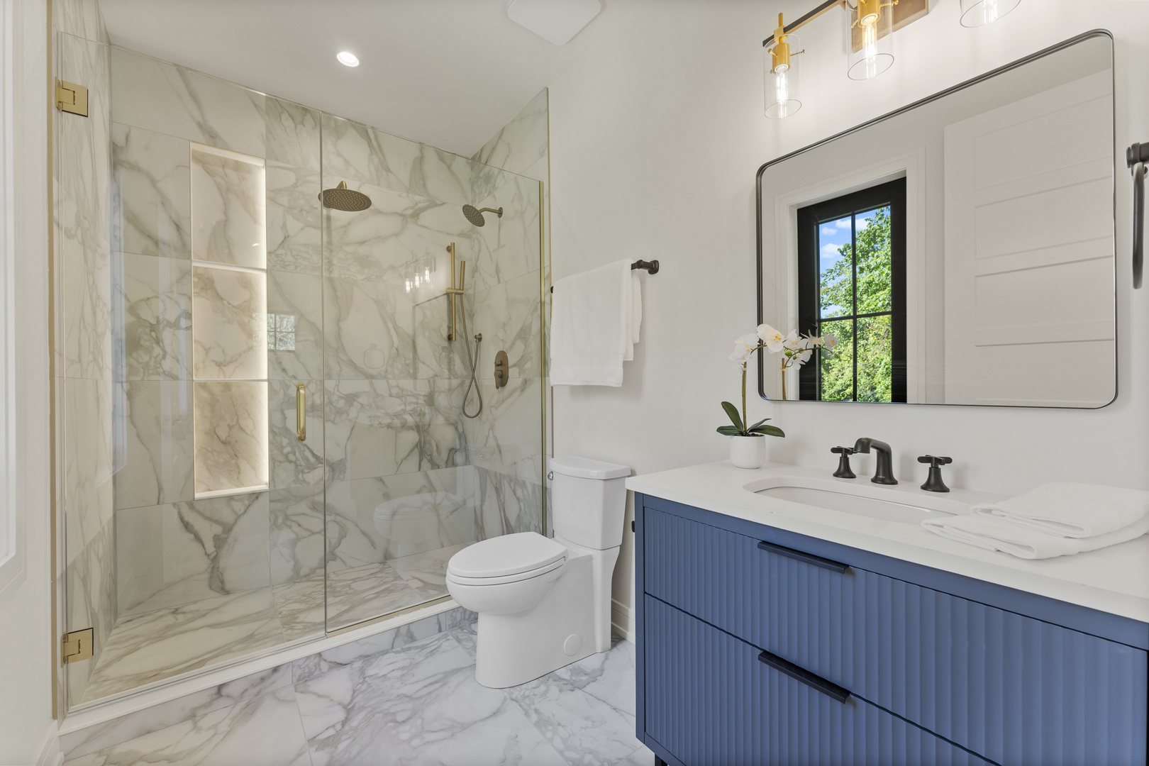 1504 Linden Circle Lemont, IL 60439 - Photo 34 of 54 a bathroom with a sink a toilet and shower