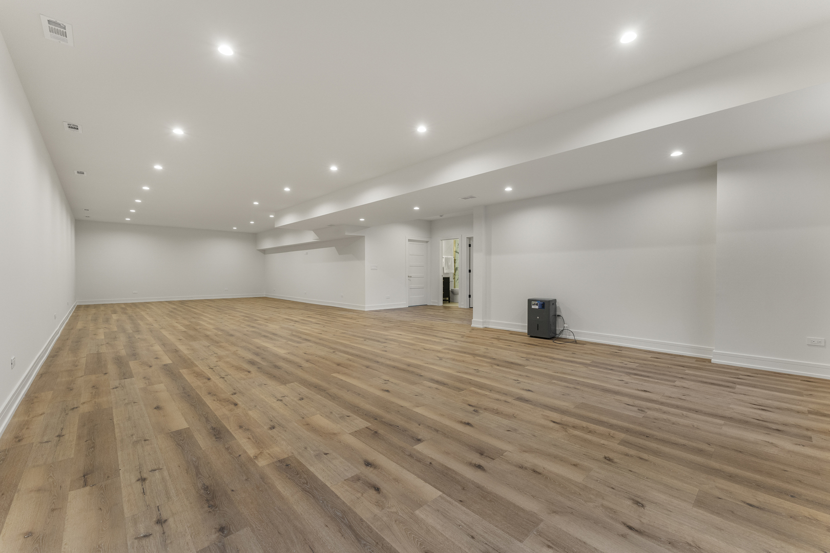 1504 Linden Circle Lemont, IL 60439 - Photo 37 of 54 a view of empty room with wooden floor