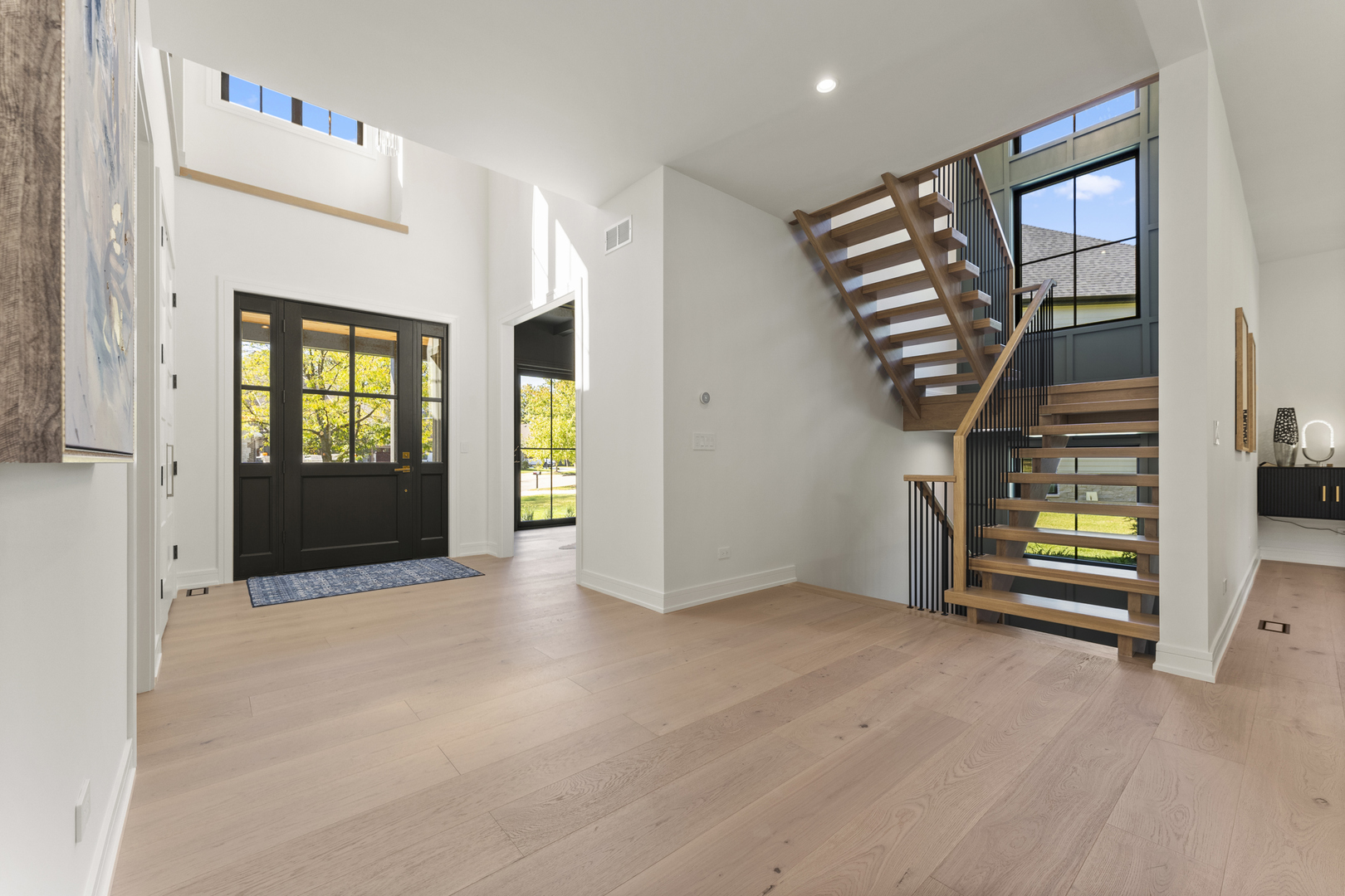 1504 Linden Circle Lemont, IL 60439 - Photo 7 of 54 wooden floor in an empty room with a window