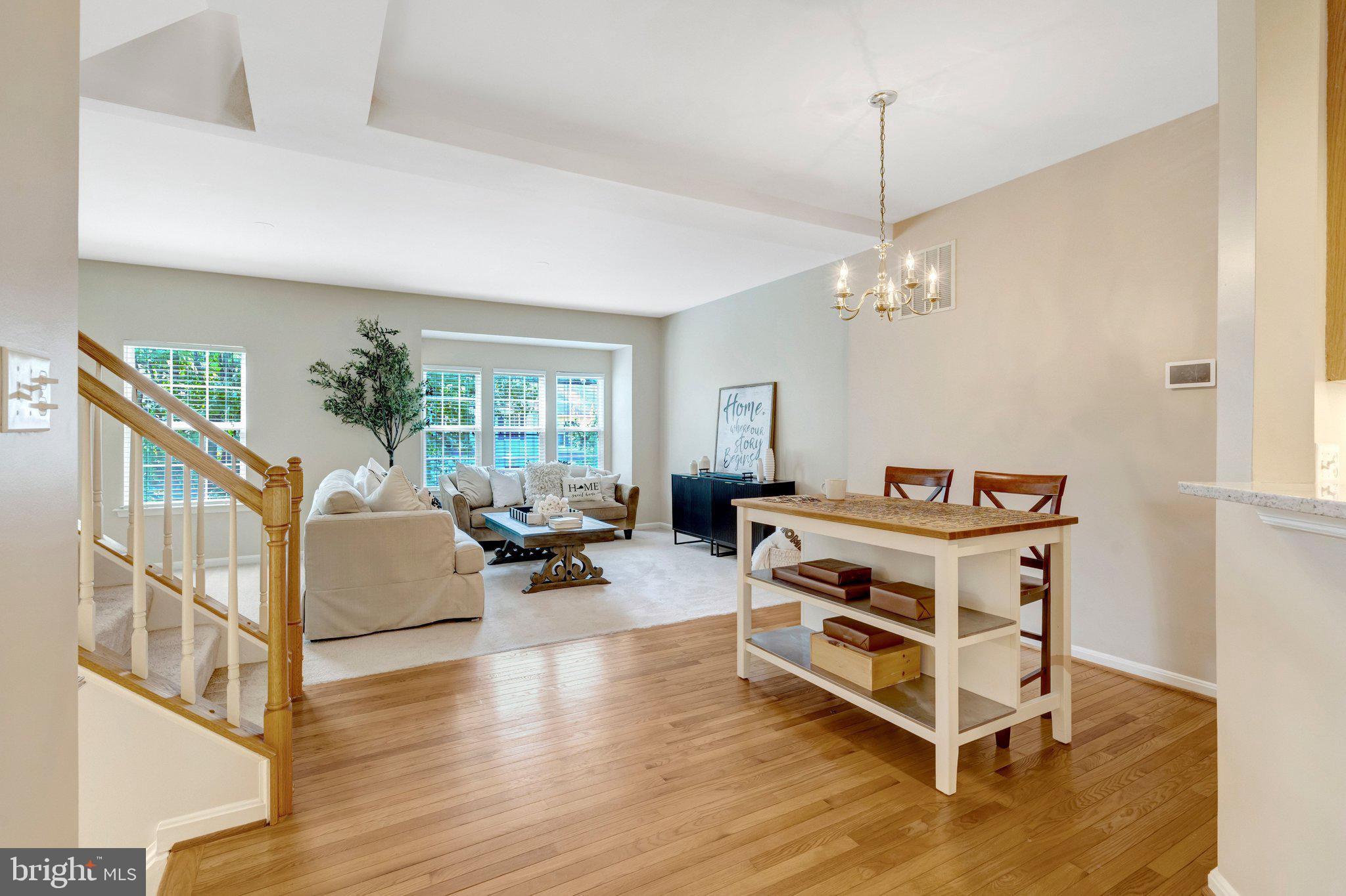7706 Shadowcreek Terrace Springfield, VA 22153 - Photo 6 of 30 a living room with furniture and a chandelier