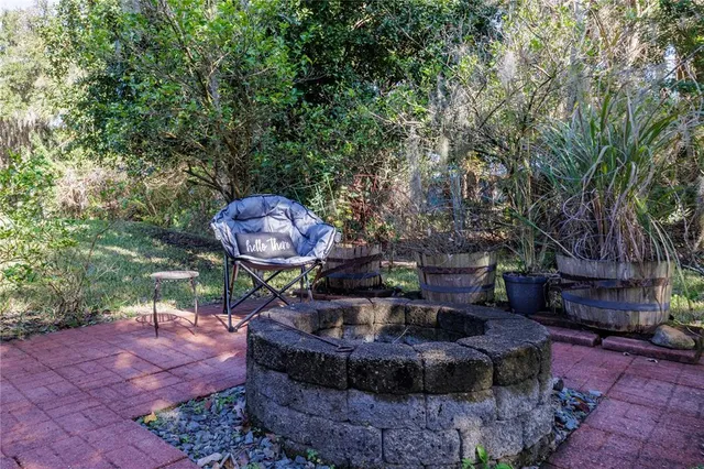 a view of a couches in backyard of the house