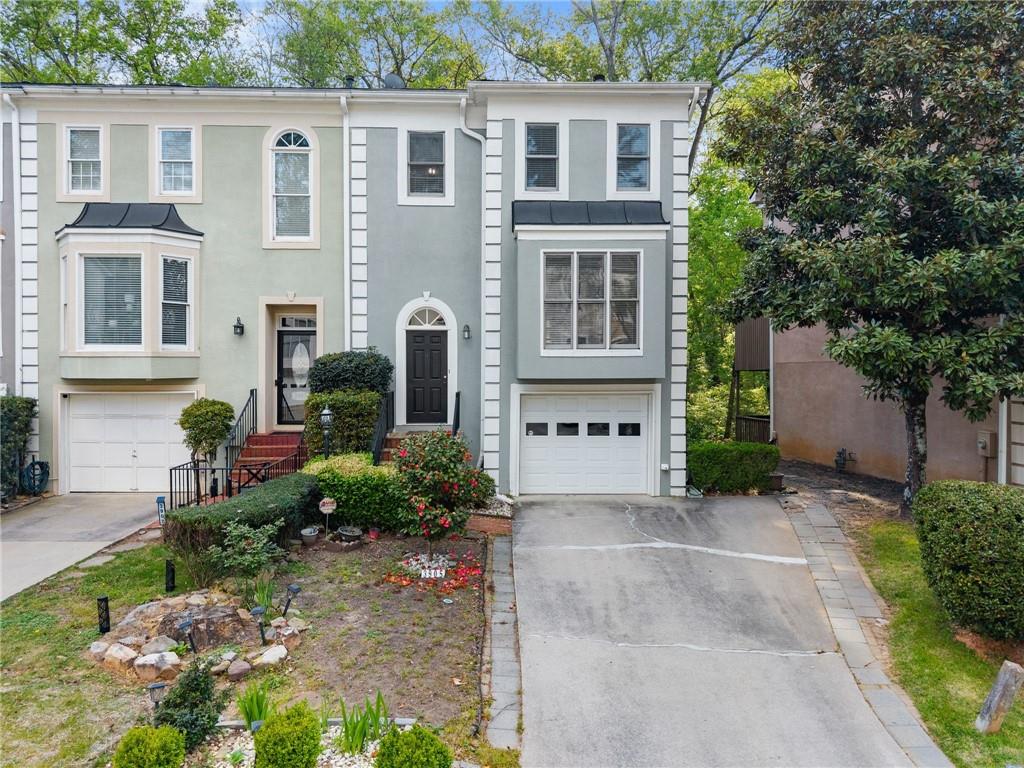 3905 Meeting Street Northwest Duluth, GA 30096 - Photo 1 of 1 a front view of a house with garden
