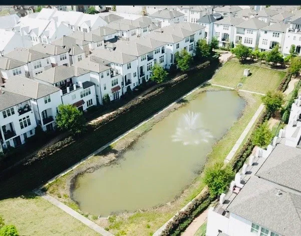 a view of swimming pool from a balcony