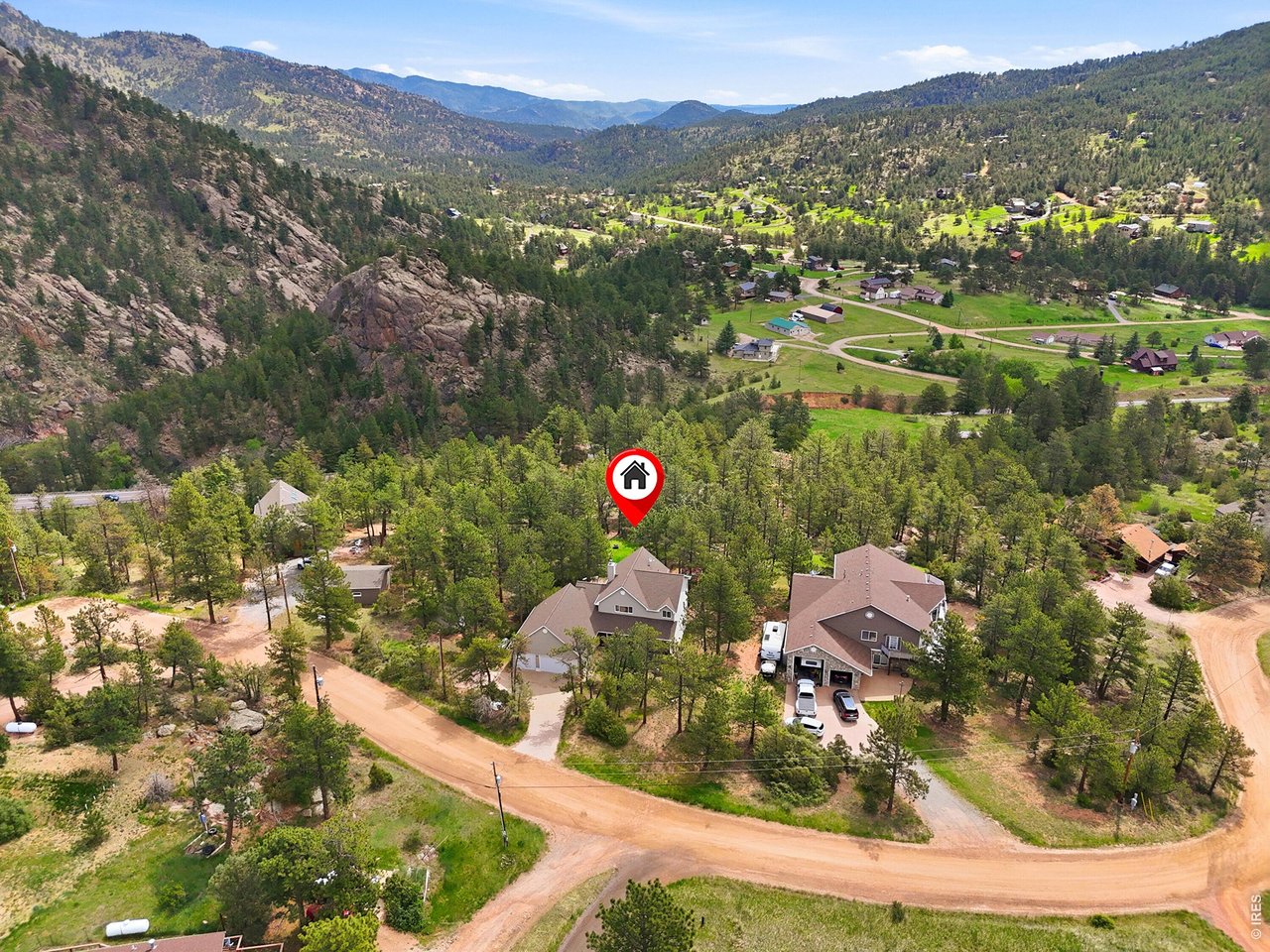 256 Choctaw Road Lyons, CO 80540 - Photo 49 of 50 an aerial view of residential houses with outdoor space and trees