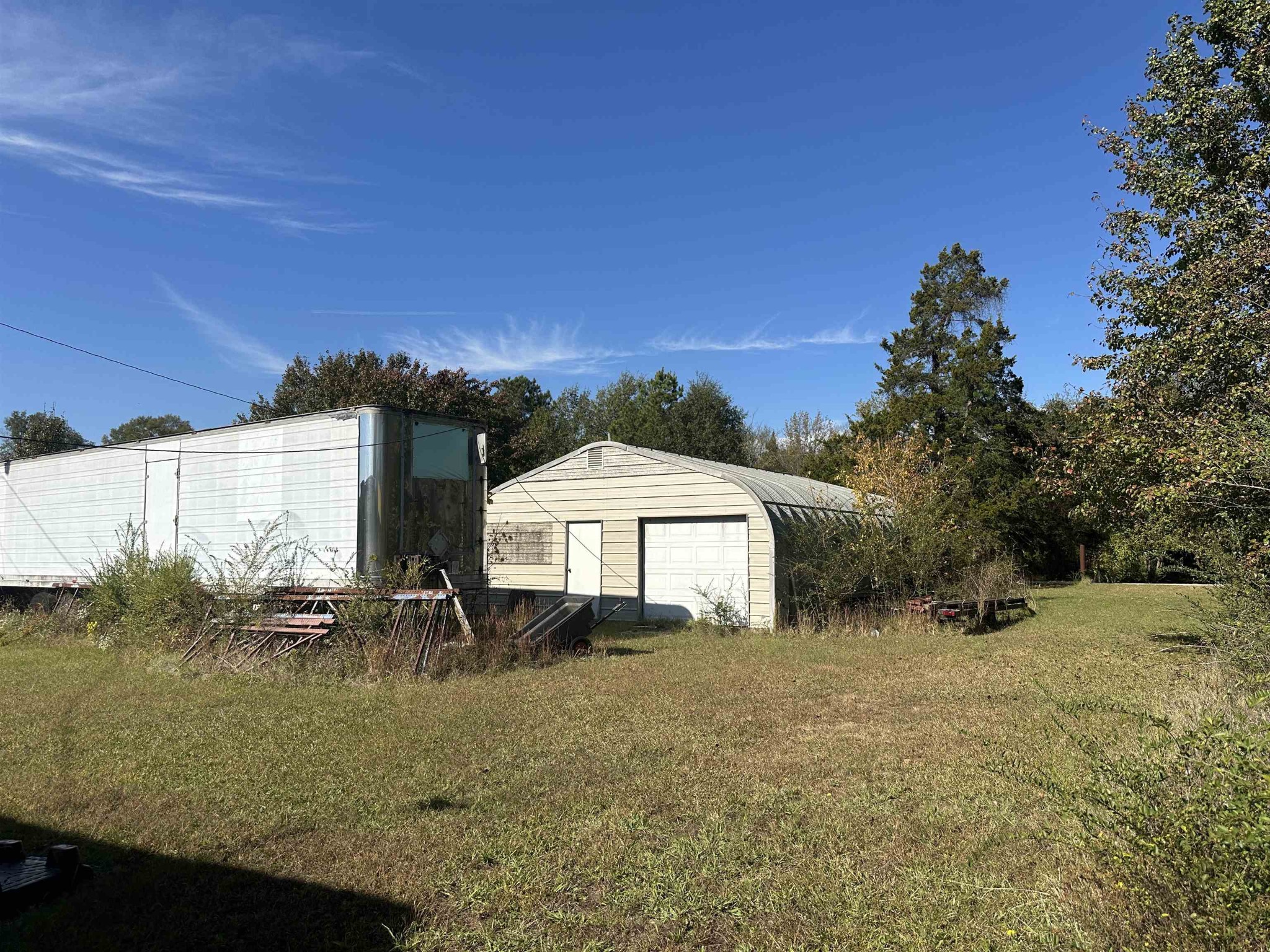 2645 Highway 64 Crump, TN 38310 - Photo 15 of 23 a front view of a house with a yard