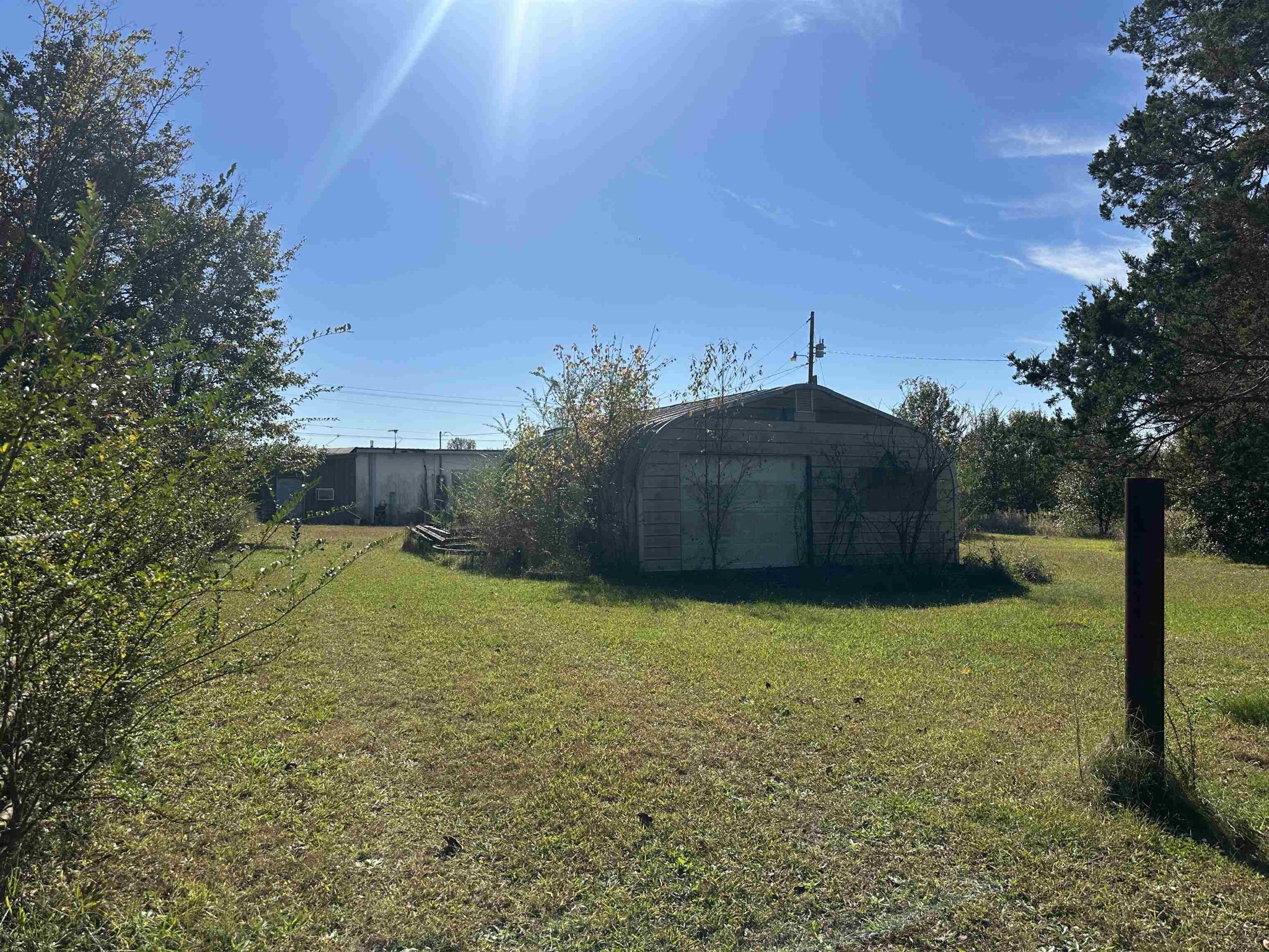 2645 Highway 64 Crump, TN 38310 - Photo 18 of 23 a backyard of a house