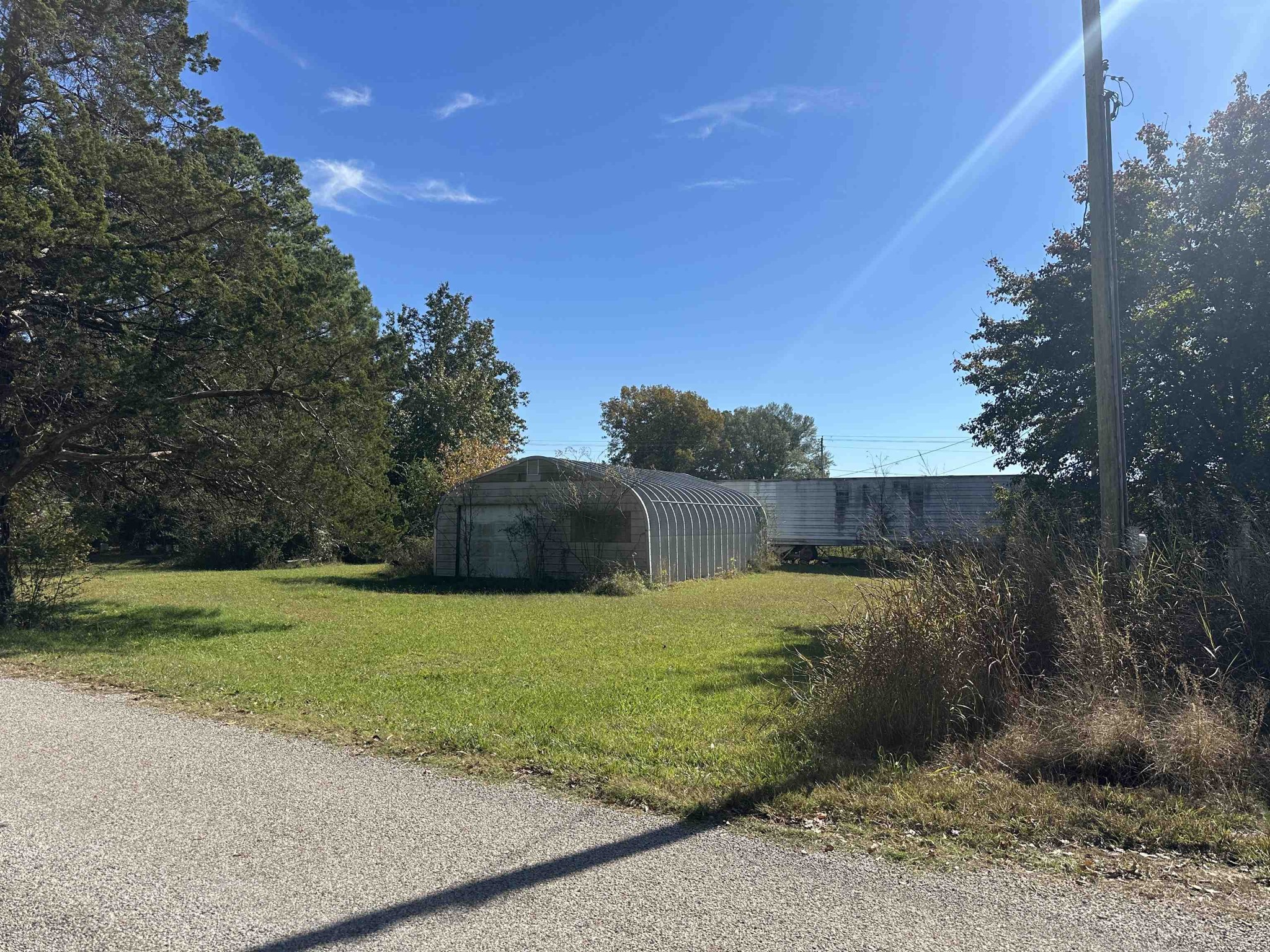2645 Highway 64 Crump, TN 38310 - Photo 19 of 23 a view of a yard with large trees