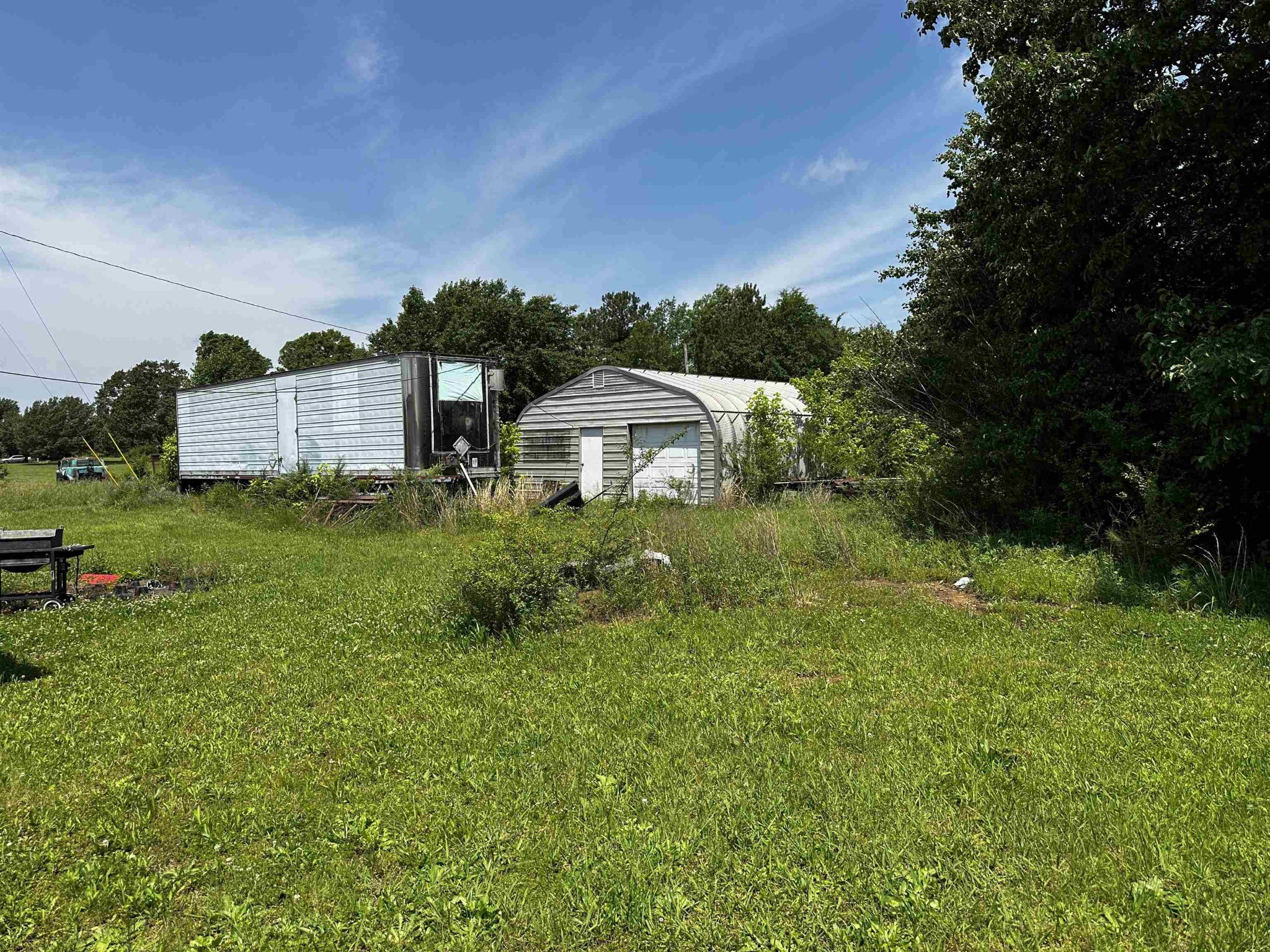 2645 Highway 64 Crump, TN 38310 - Photo 5 of 23 a house view with a garden space