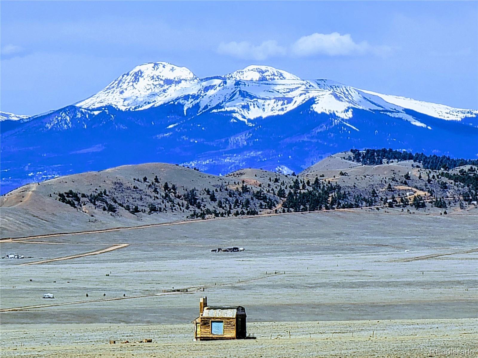 6372 Mesa Road Hartsel, CO 80449 - Photo 5 of 13 a view of a lake with a mountain
