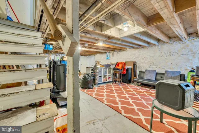 an aerial view of residential houses with yard