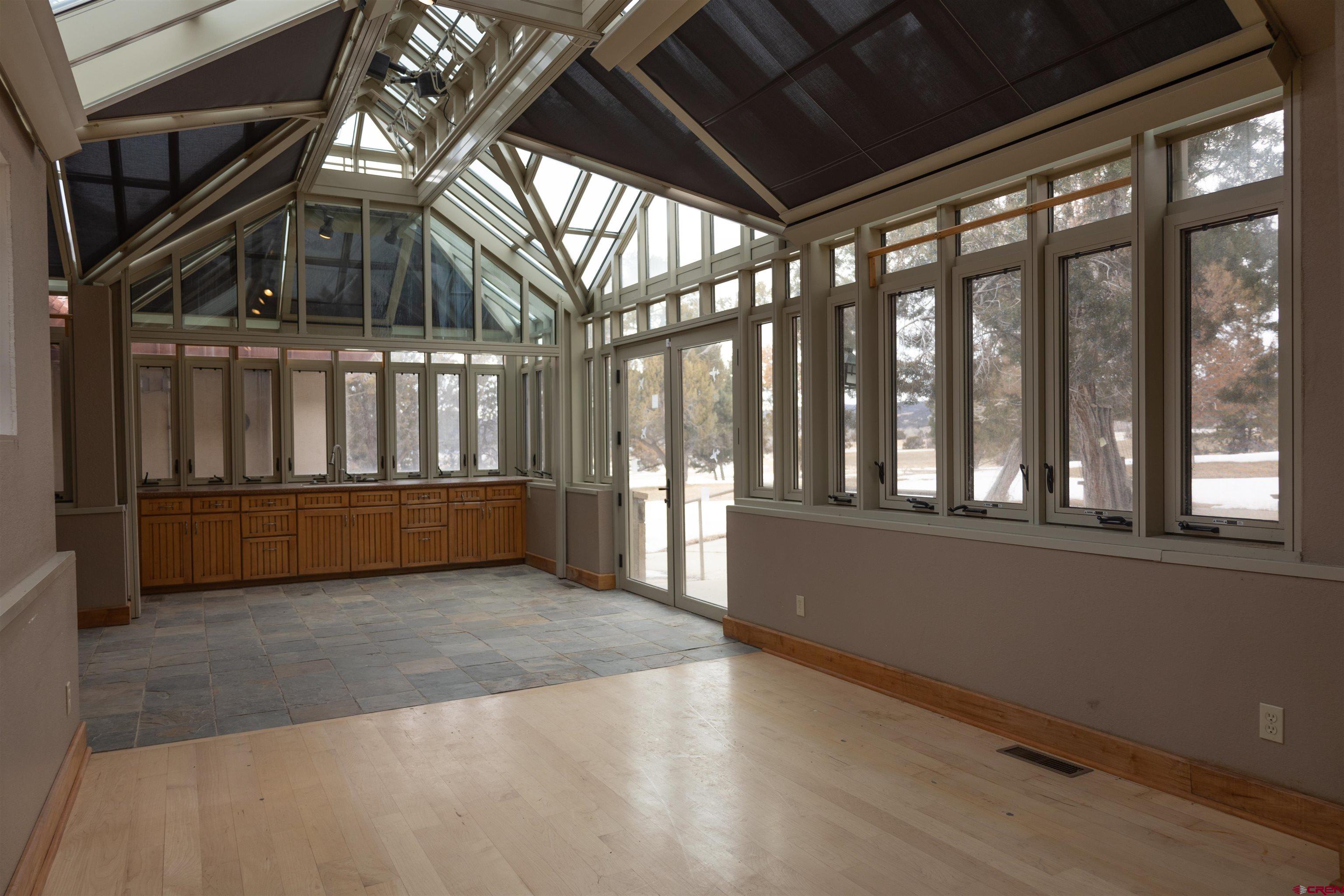 40926 Rd J Mancos, CO 81328 - Photo 7 of 15 a view of an empty room with wooden floor