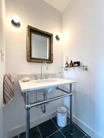 a view of balcony with wooden floor and fence