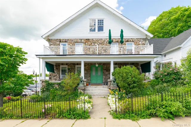 a house view with a garden space