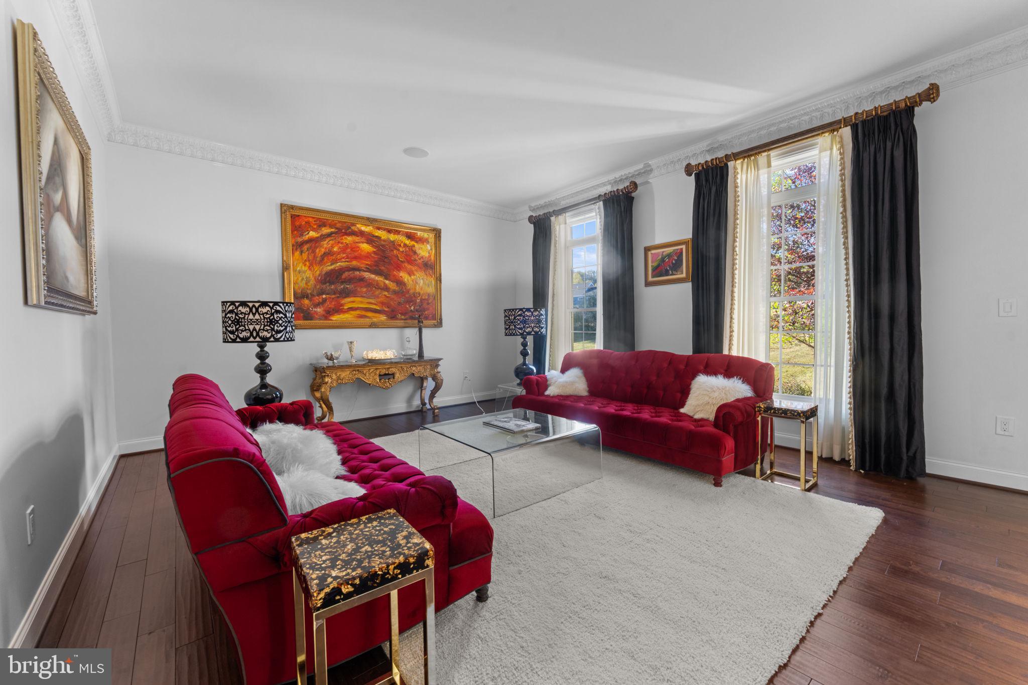 11561 Stuart Mill Road Oakton, VA 22124 - Photo 17 of 76 a living room with furniture and a flat screen tv