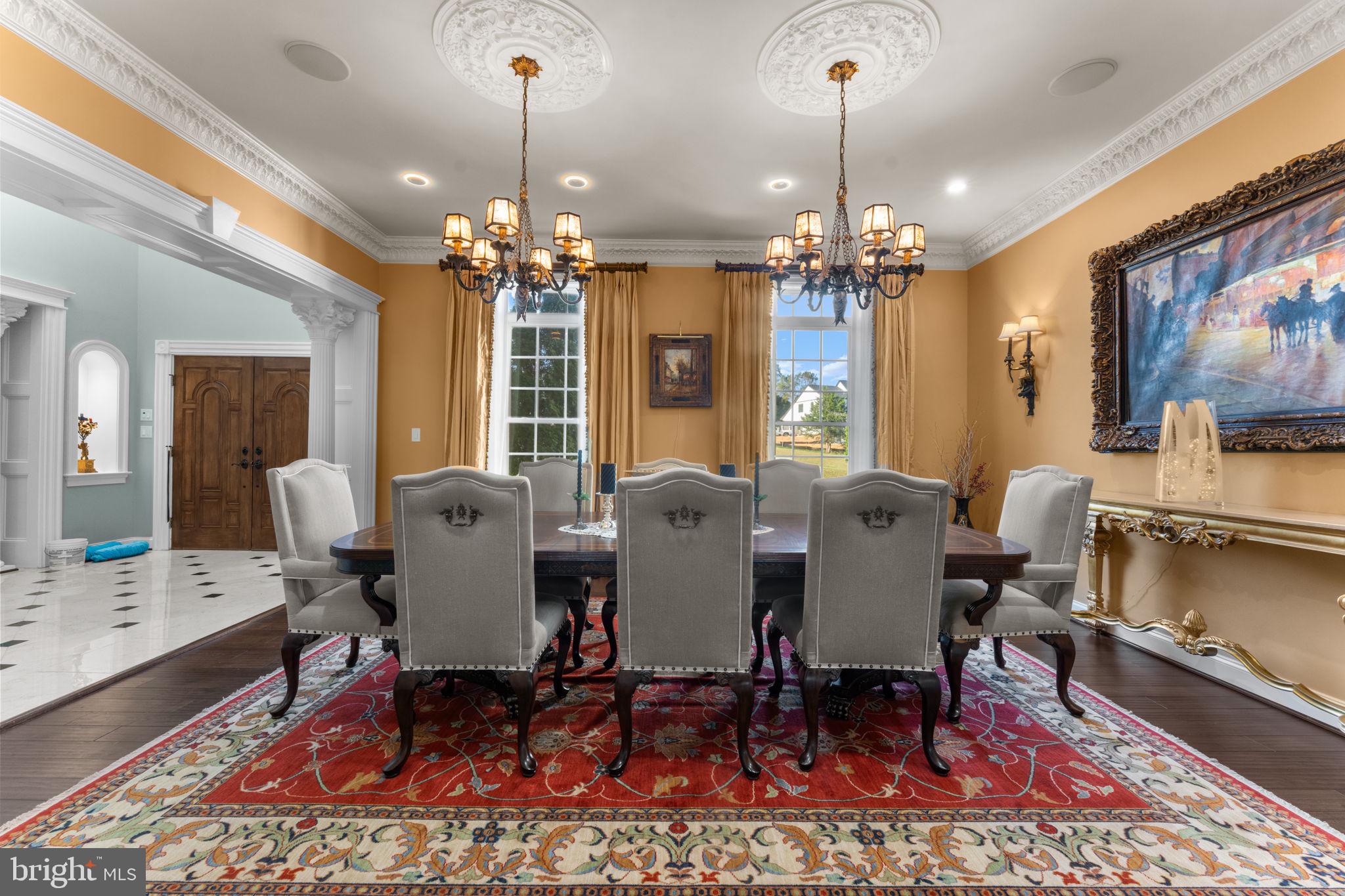 11561 Stuart Mill Road Oakton, VA 22124 - Photo 19 of 76 a view of a dining room with furniture window and wooden floor