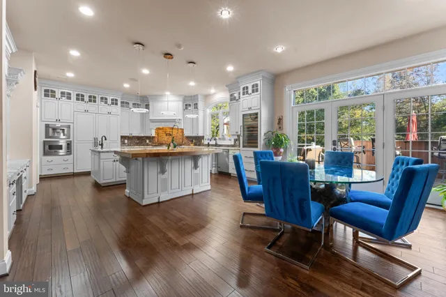 a view of a livingroom with furniture window and wooden floor