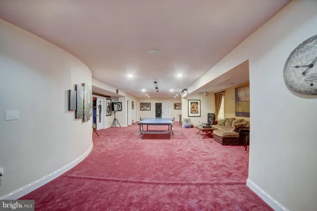 a view of a house with backyard sitting area and garden
