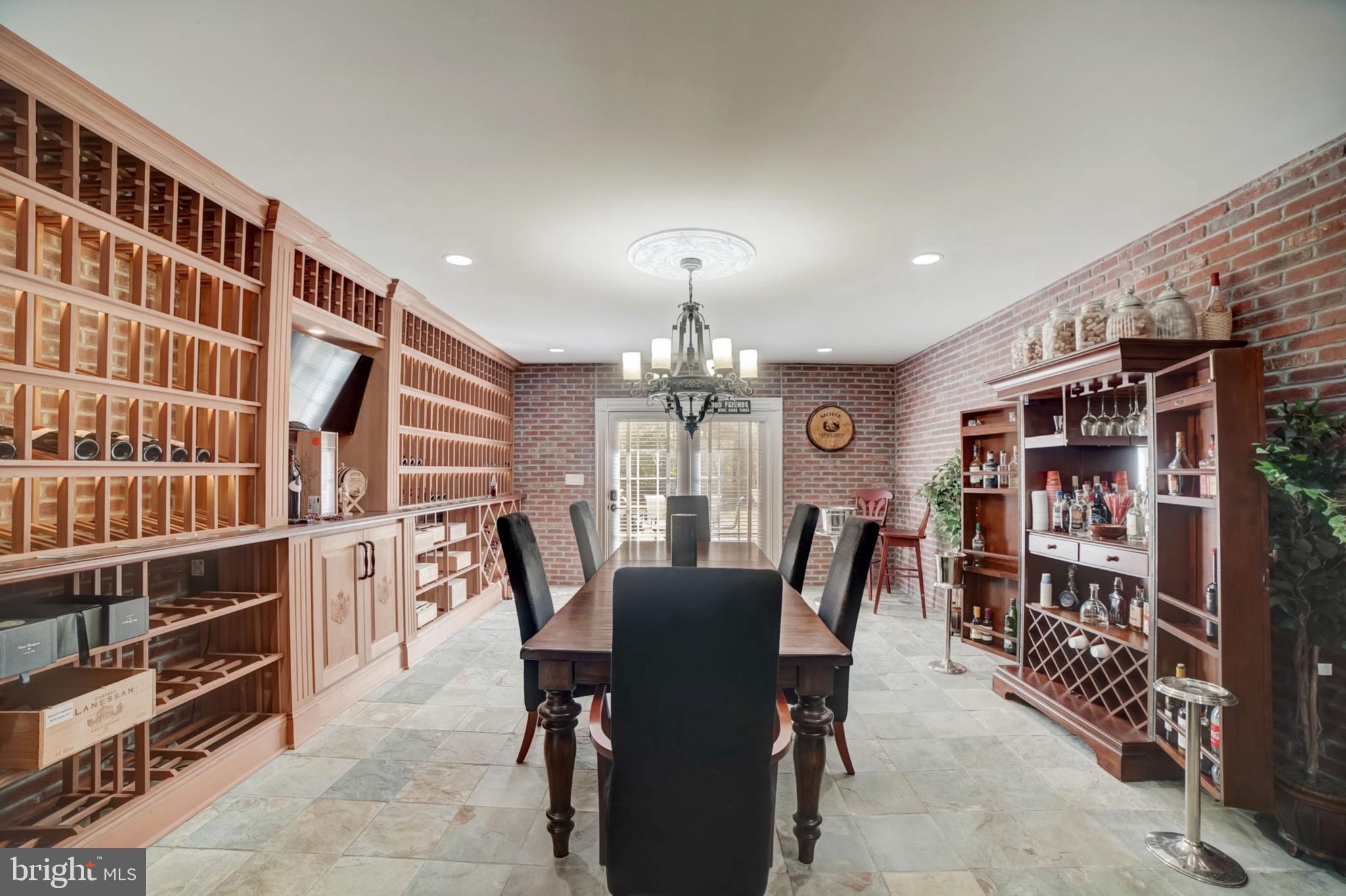 11561 Stuart Mill Road Oakton, VA 22124 - Photo 55 of 76 a view of a dining room with furniture