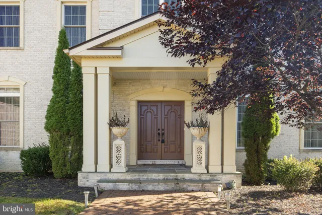 a living room with furniture rug and window