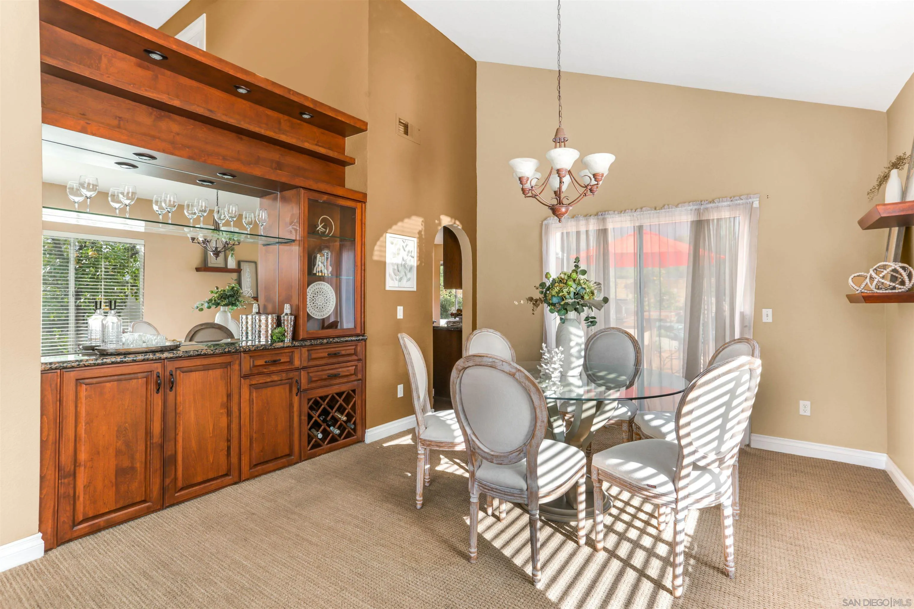 14153 Rio Court Poway, CA 92064 - Photo 11 of 48 a dining room with furniture a chandelier and window