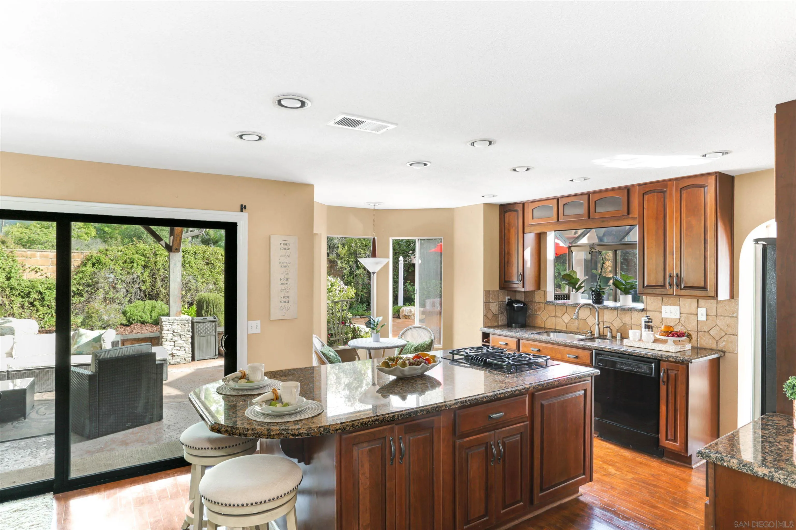 14153 Rio Court Poway, CA 92064 - Photo 14 of 48 a kitchen with a sink and a large window