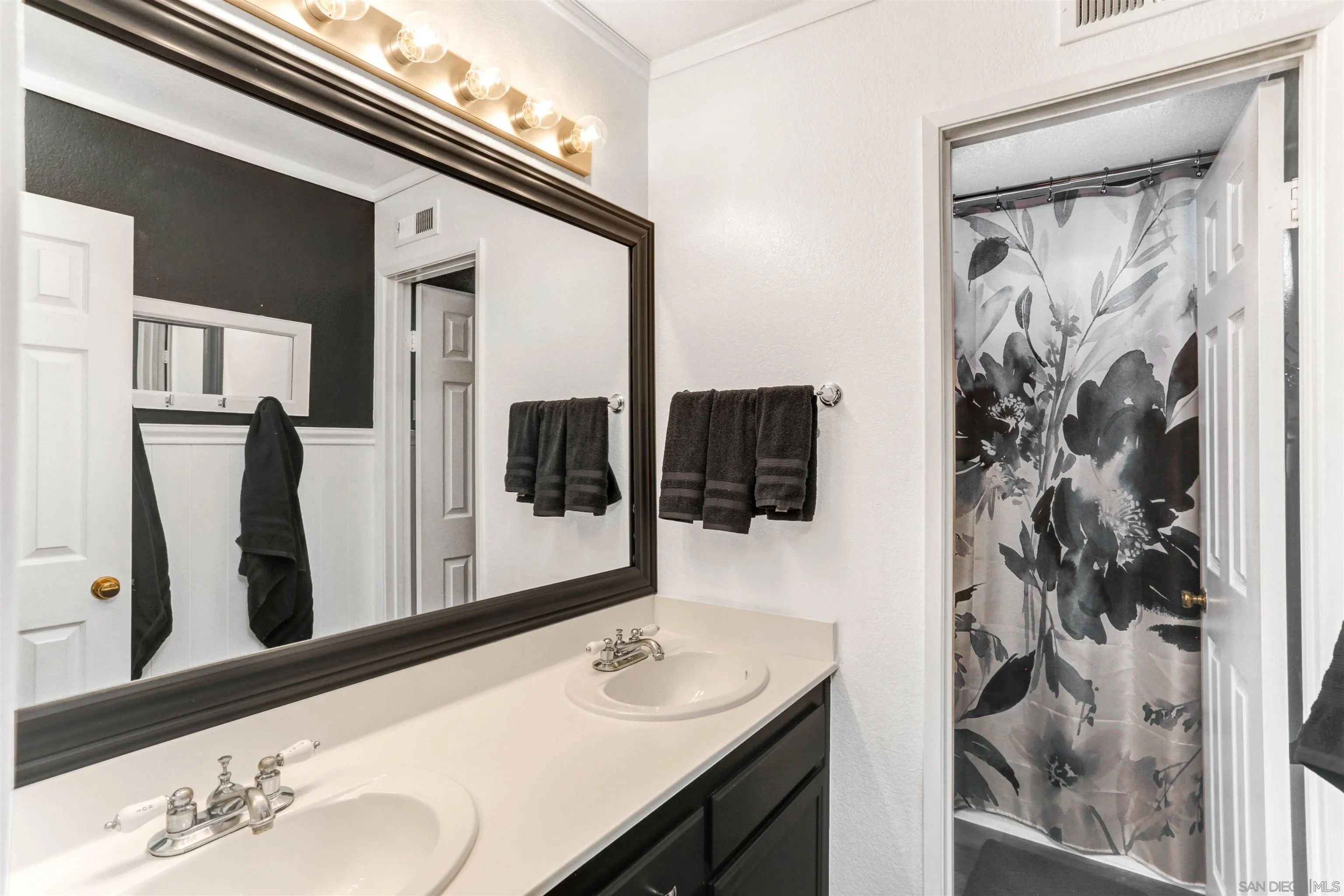 14153 Rio Court Poway, CA 92064 - Photo 30 of 48 a bathroom with a sink and a mirror