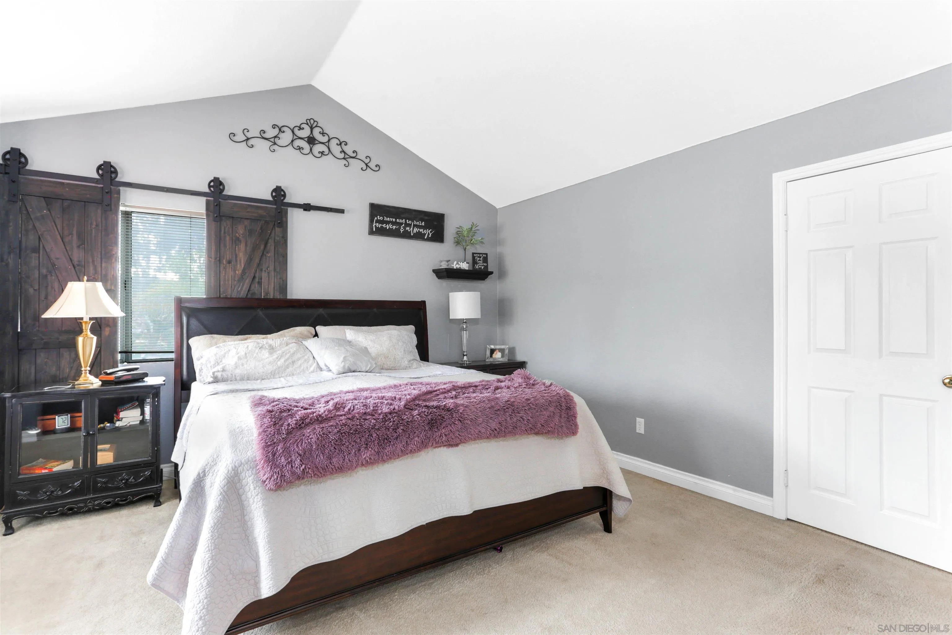 14153 Rio Court Poway, CA 92064 - Photo 32 of 48 a bedroom with a bed and a night stand
