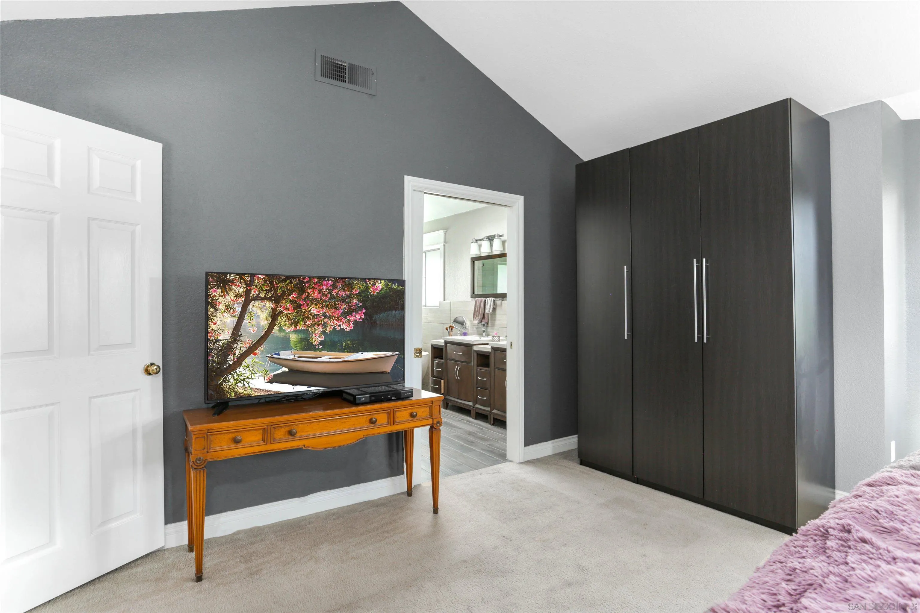 14153 Rio Court Poway, CA 92064 - Photo 34 of 48 a living room with furniture and a flat screen tv