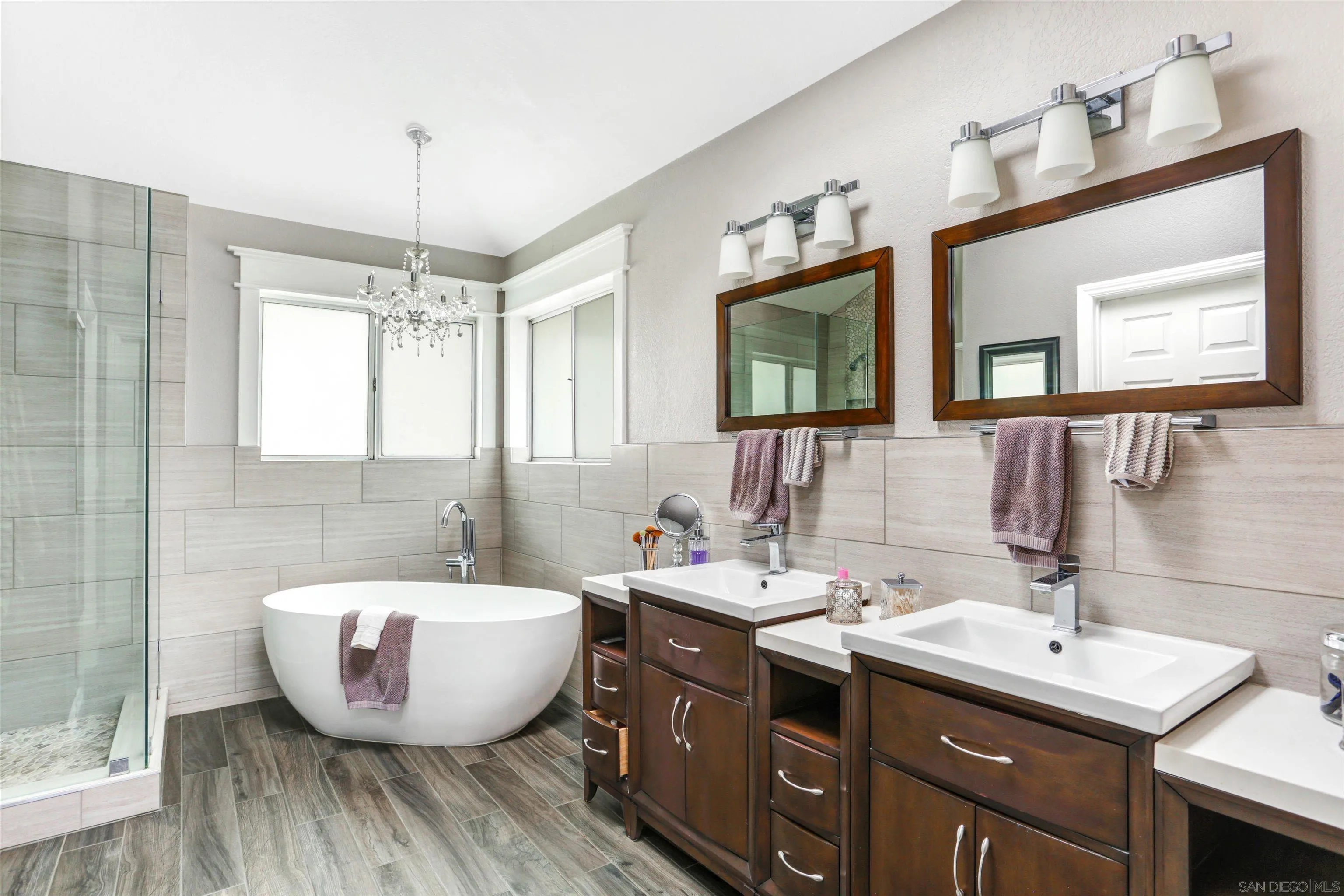 14153 Rio Court Poway, CA 92064 - Photo 35 of 48 a bathroom with a double vanity sink mirror and bathtub