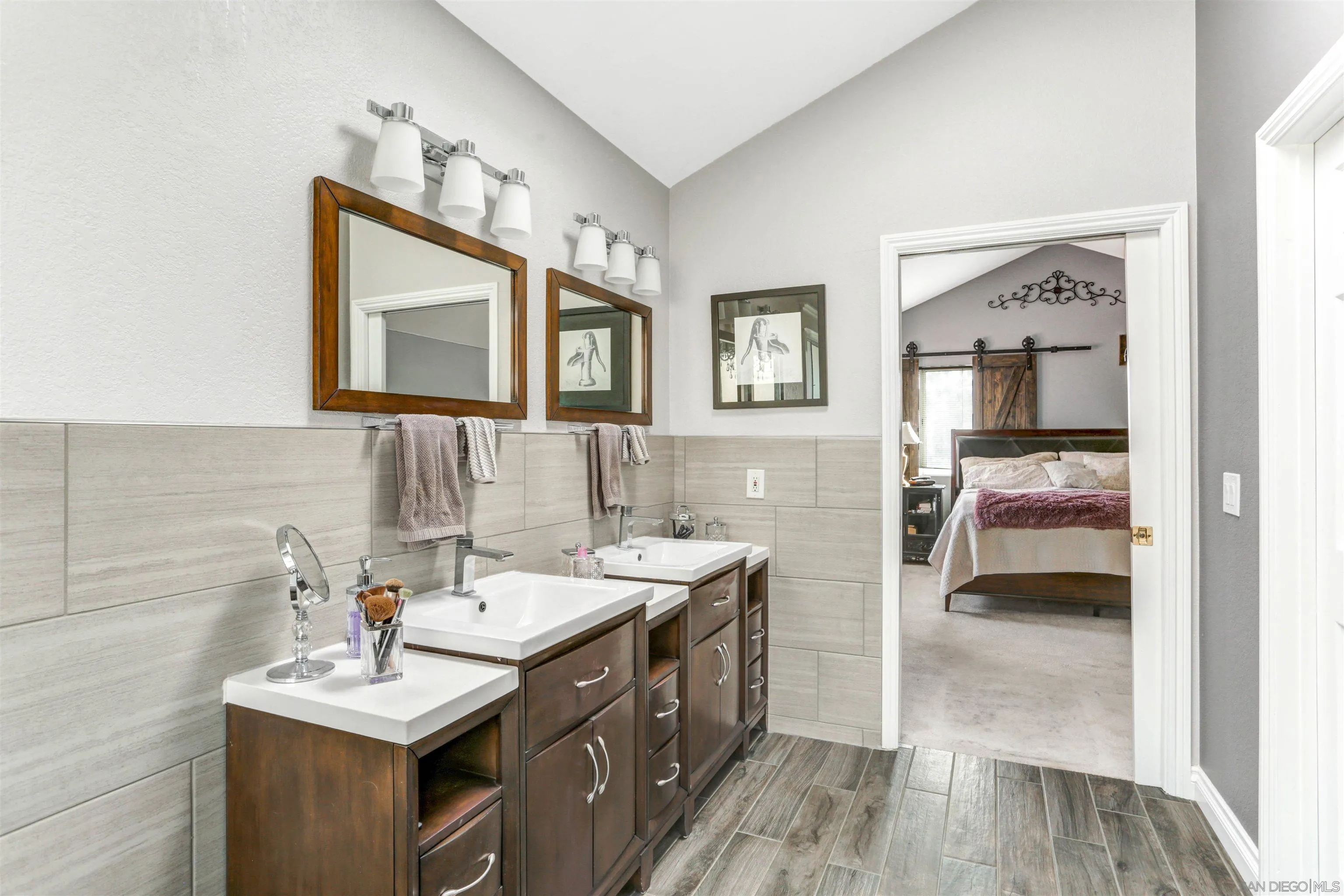 14153 Rio Court Poway, CA 92064 - Photo 37 of 48 a bathroom with a sink and a mirror