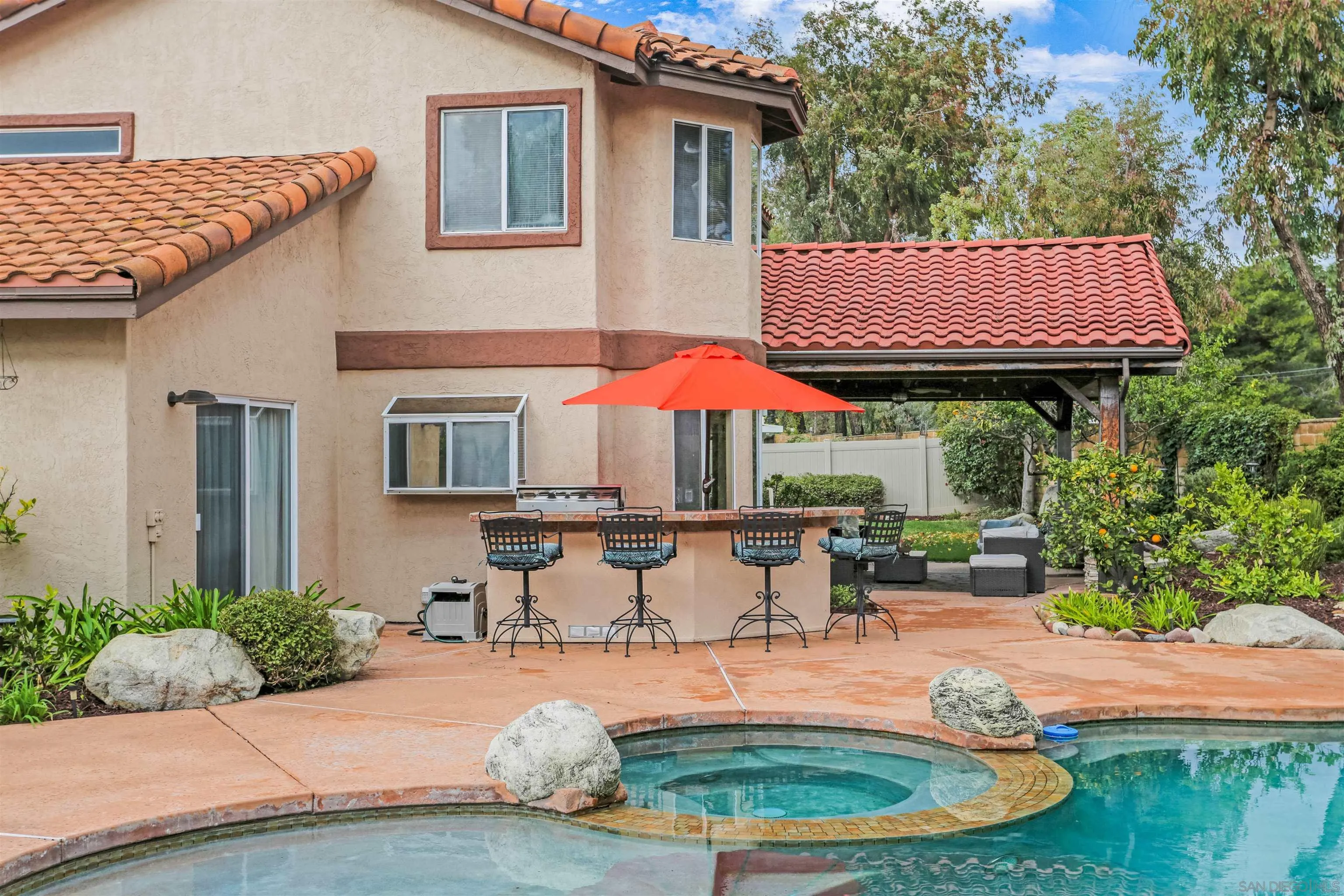 14153 Rio Court Poway, CA 92064 - Photo 42 of 48 a backyard of a house with yard fire pit and outdoor seating