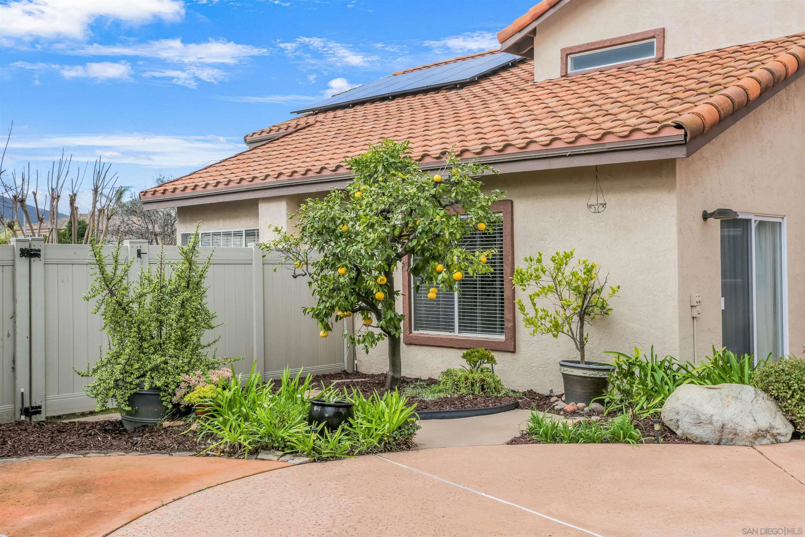 14153 Rio Court Poway, CA 92064 - Photo 43 of 48 a front view of a house with garden