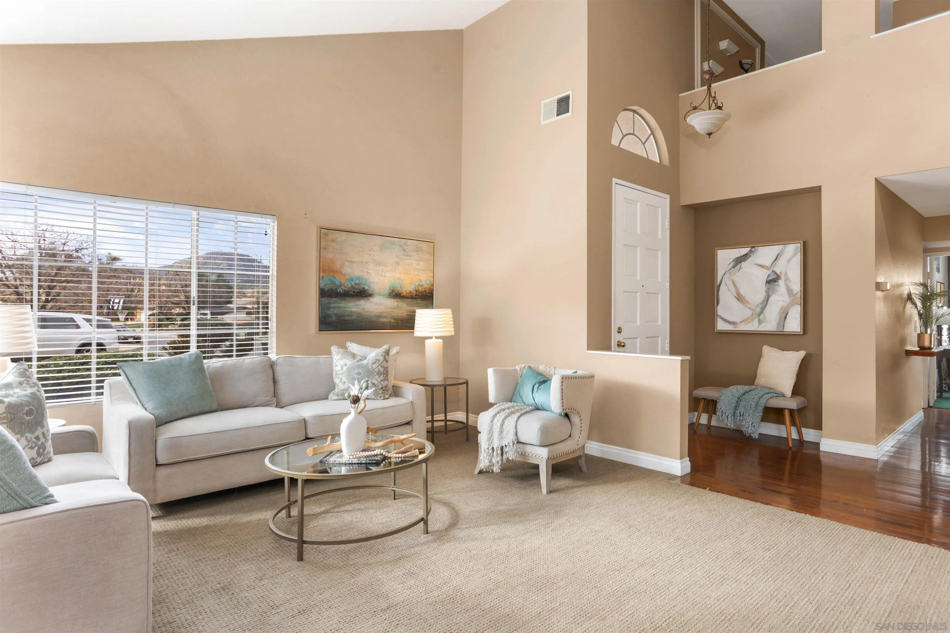14153 Rio Court Poway, CA 92064 - Photo 8 of 48 a living room with furniture and a floor to ceiling window