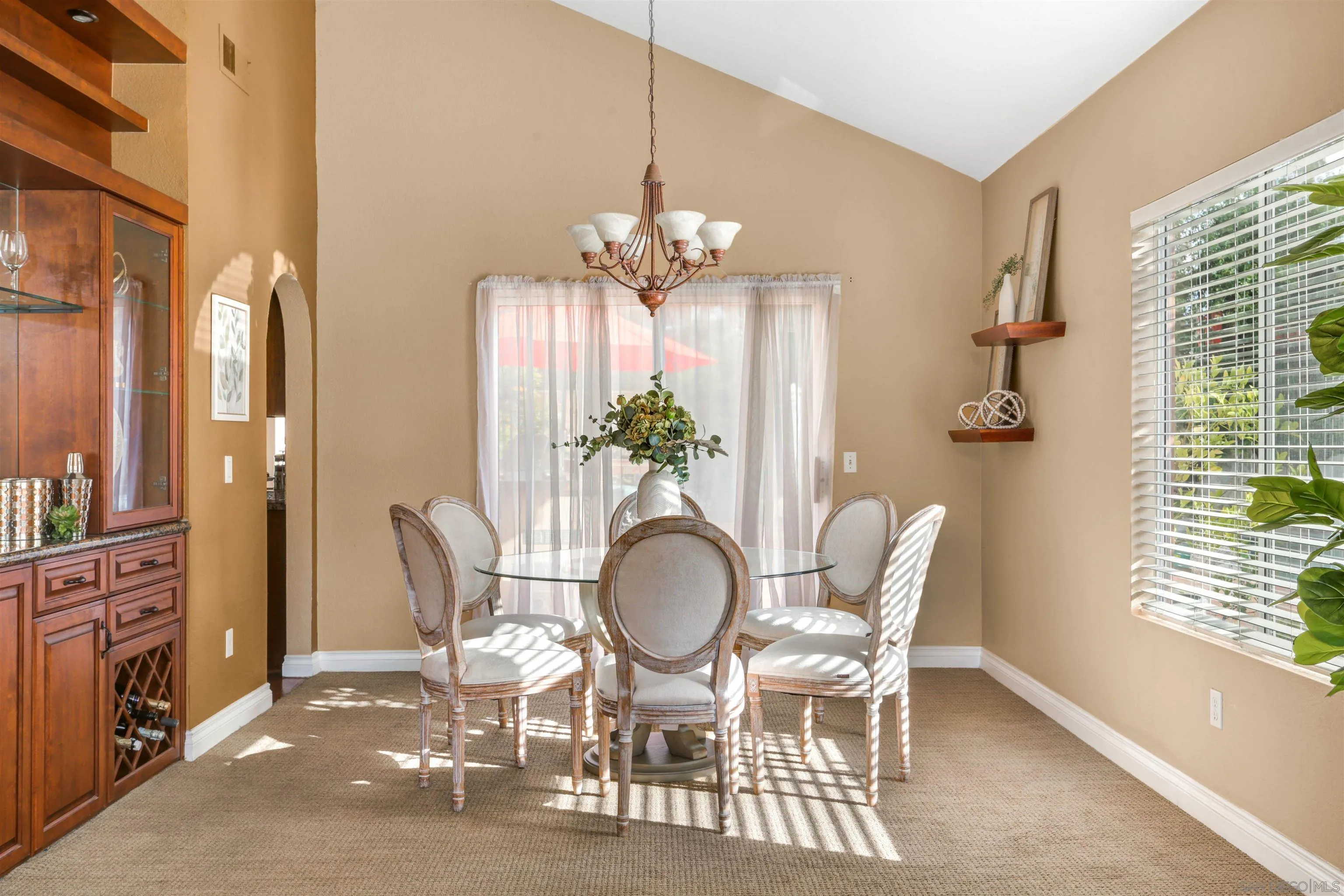14153 Rio Court Poway, CA 92064 - Photo 9 of 48 a dining room with furniture a chandelier and window