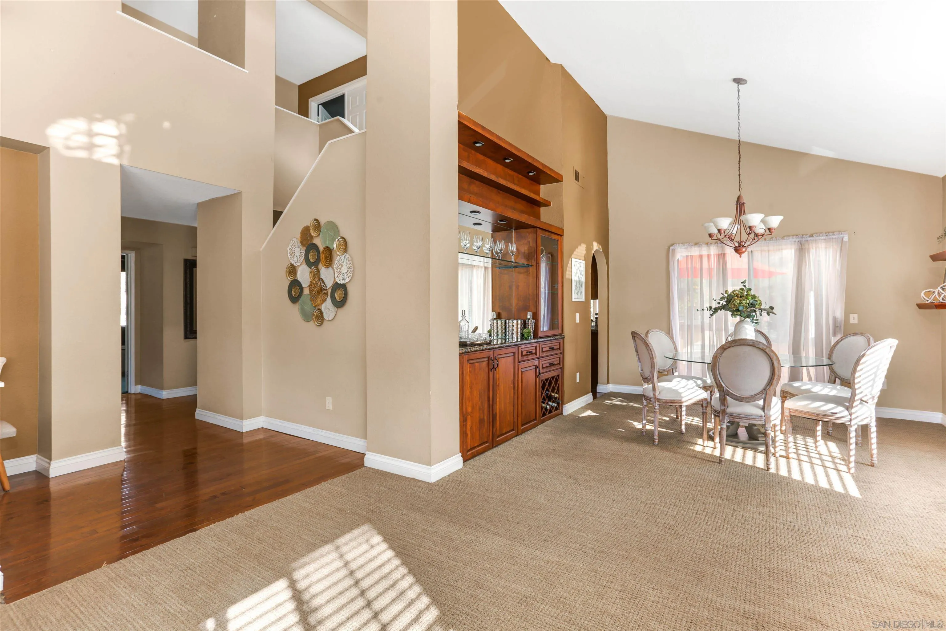 14153 Rio Court Poway, CA 92064 - Photo 10 of 48 a view of a livingroom with furniture wooden floor and a chandelier