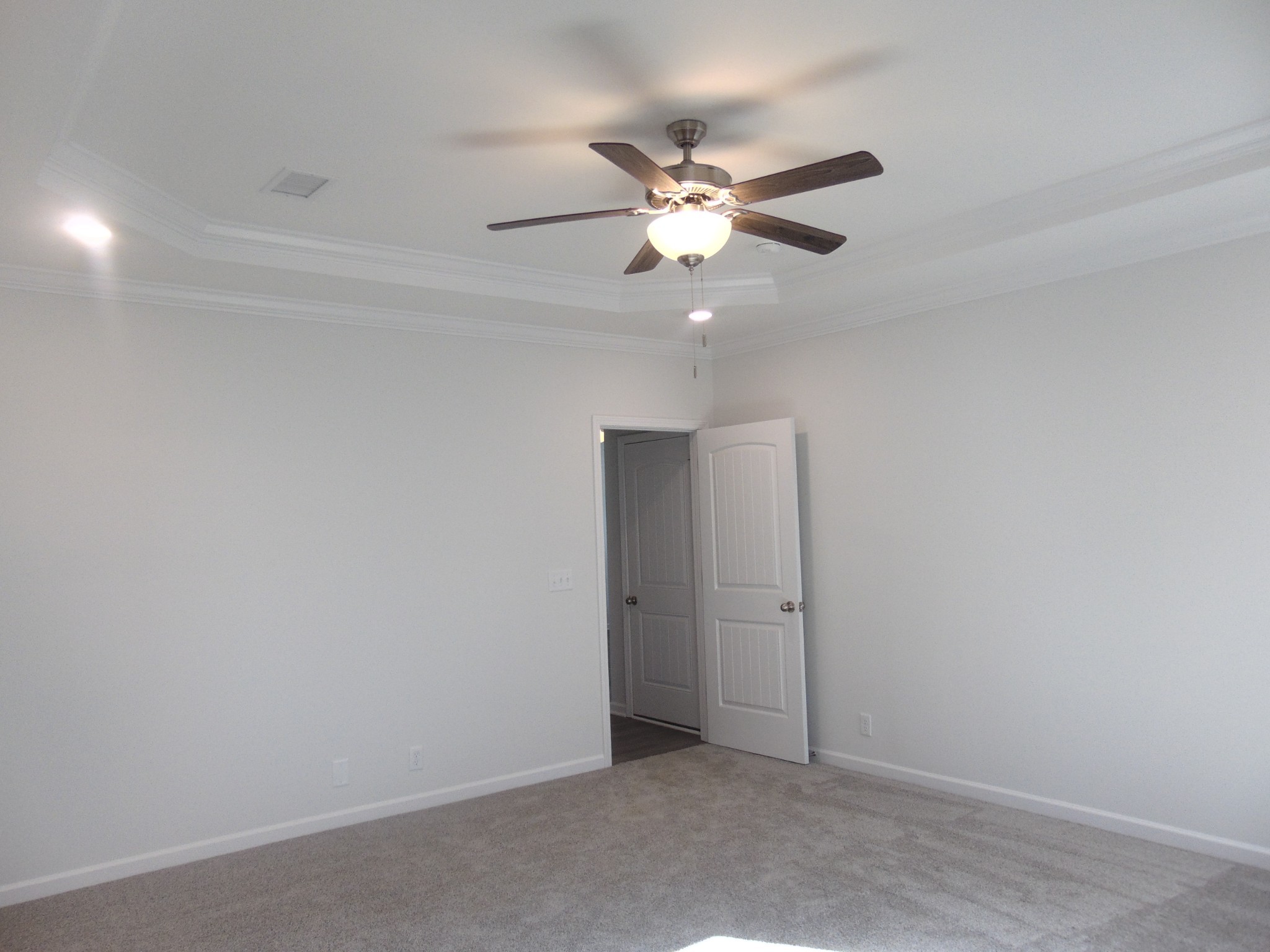 281 Spring Street La Vergne, TN 37086 - Photo 10 of 26 an empty room with closet and a chandelier fan