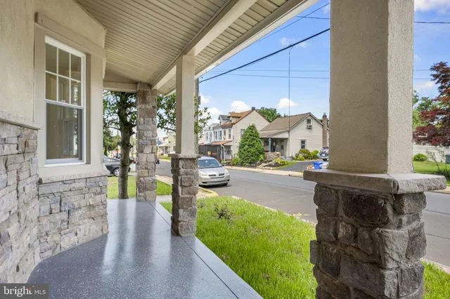 a view of swimming pool with outdoor seating