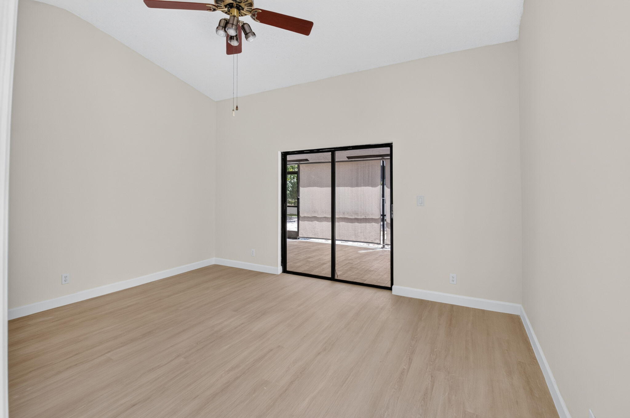 21070 Woodspring Avenue Boca Raton, FL 33428 - Photo 15 of 30 a view of an empty room with a window