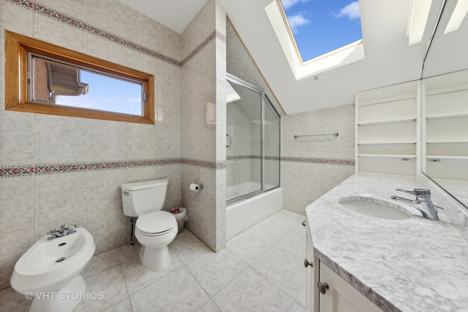 6705 Fieldstone Drive Burr Ridge, IL 60527 - Photo 24 of 41 a bathroom with a granite countertop sink and a toilet