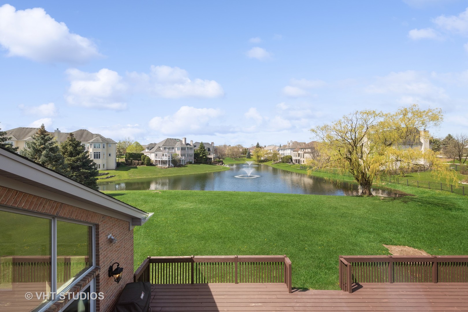 6705 Fieldstone Drive Burr Ridge, IL 60527 - Photo 29 of 41 a view of a lake from a balcony