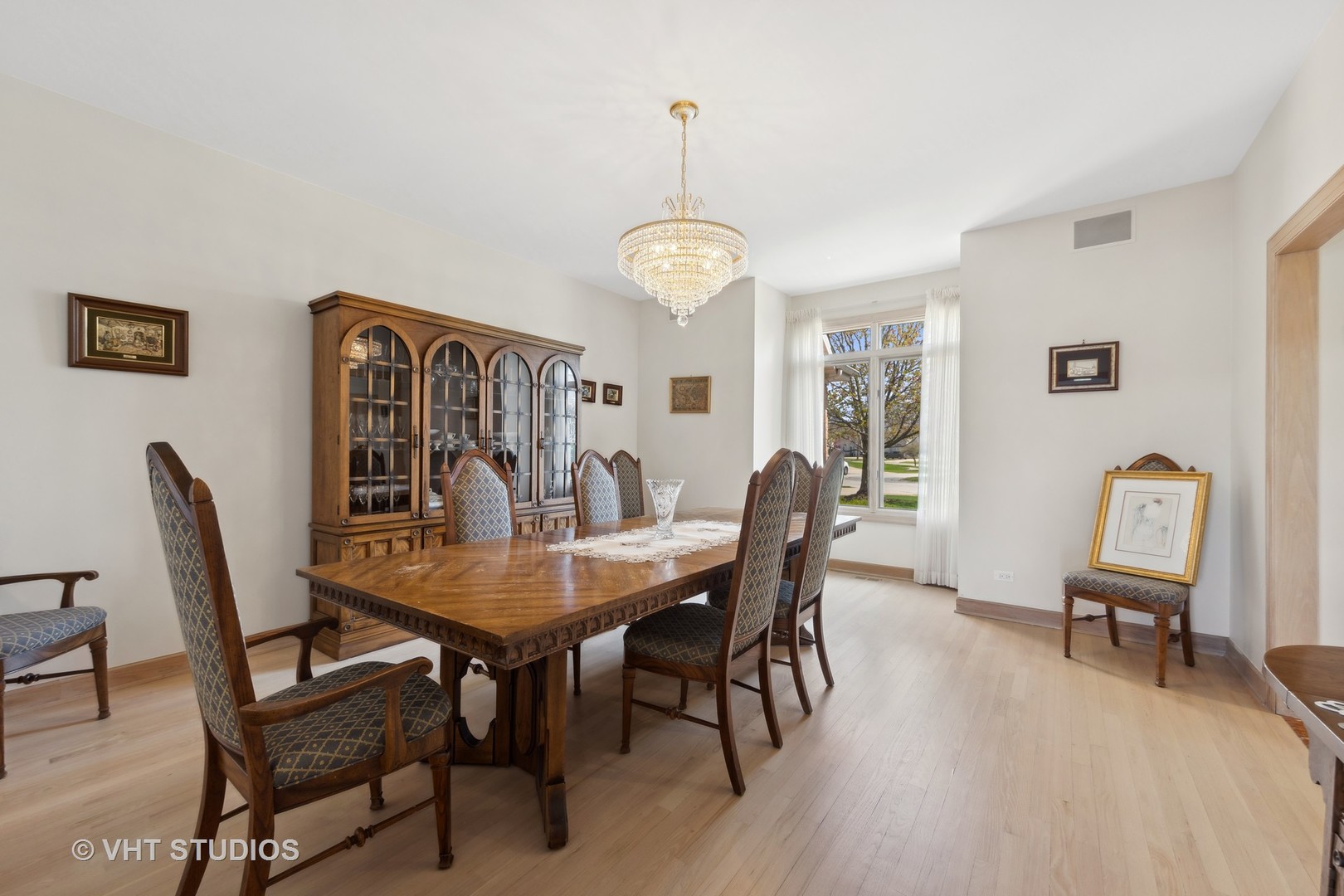 6705 Fieldstone Drive Burr Ridge, IL 60527 - Photo 31 of 41 a view of a dining room with furniture window and wooden floor