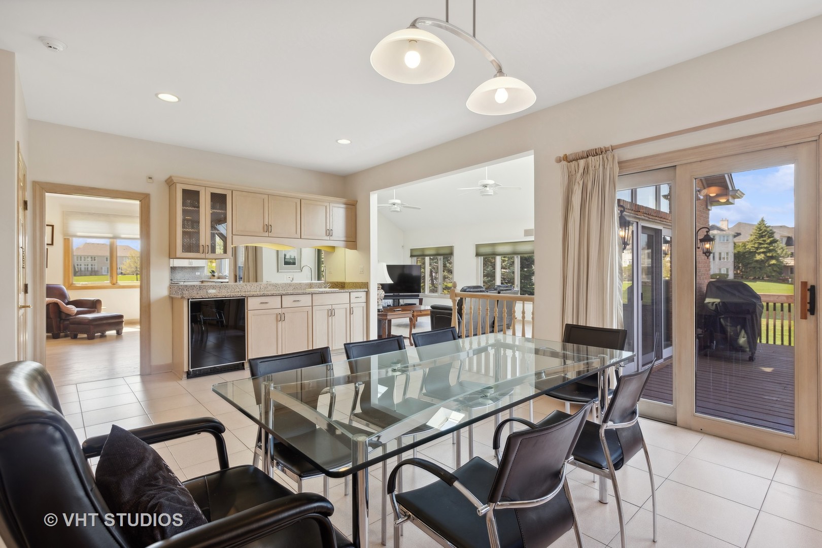 6705 Fieldstone Drive Burr Ridge, IL 60527 - Photo 39 of 41 a dining room with furniture and view of kitchen