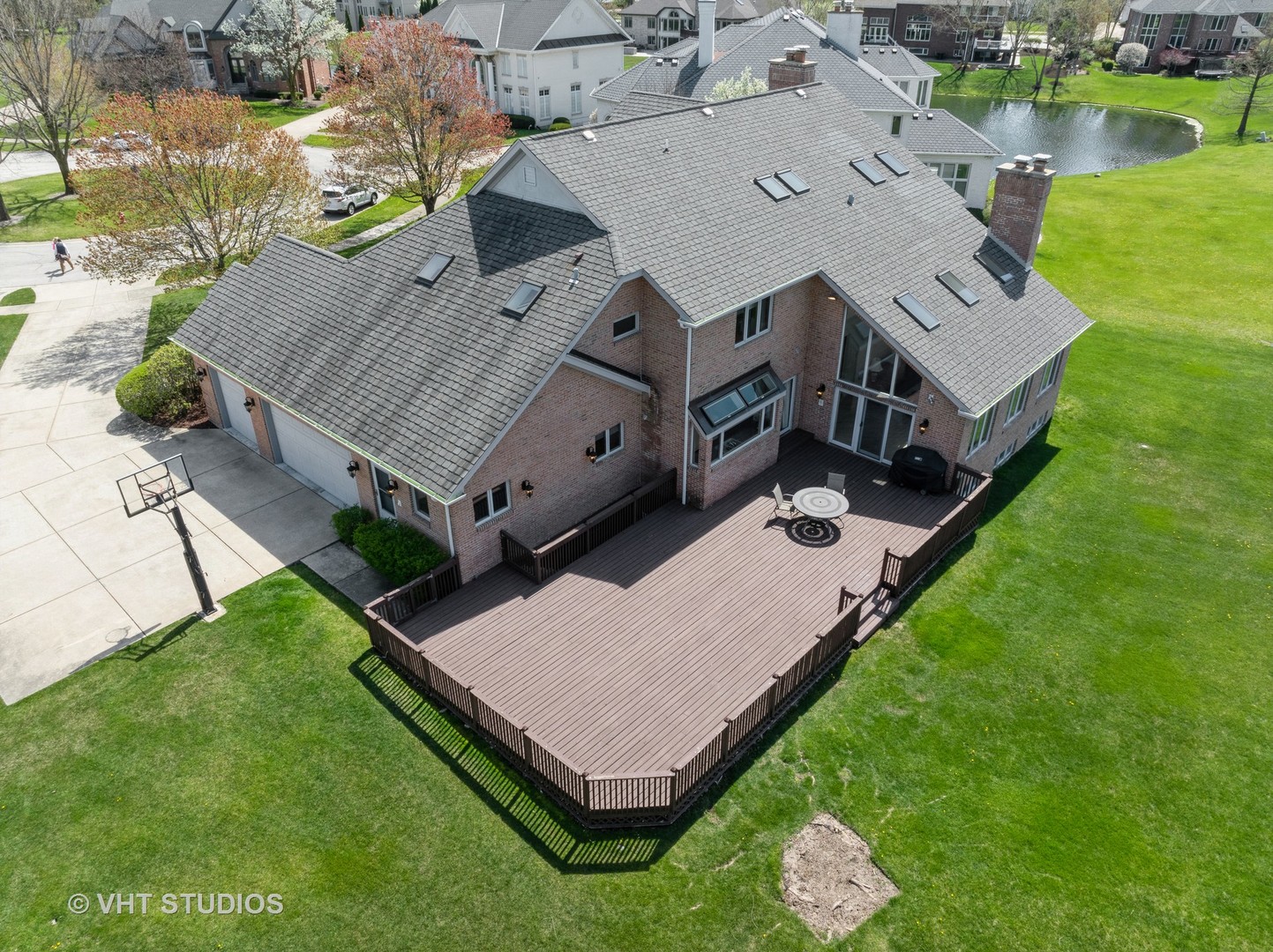 6705 Fieldstone Drive Burr Ridge, IL 60527 - Photo 5 of 41 an aerial view of a house with a garden and swimming pool