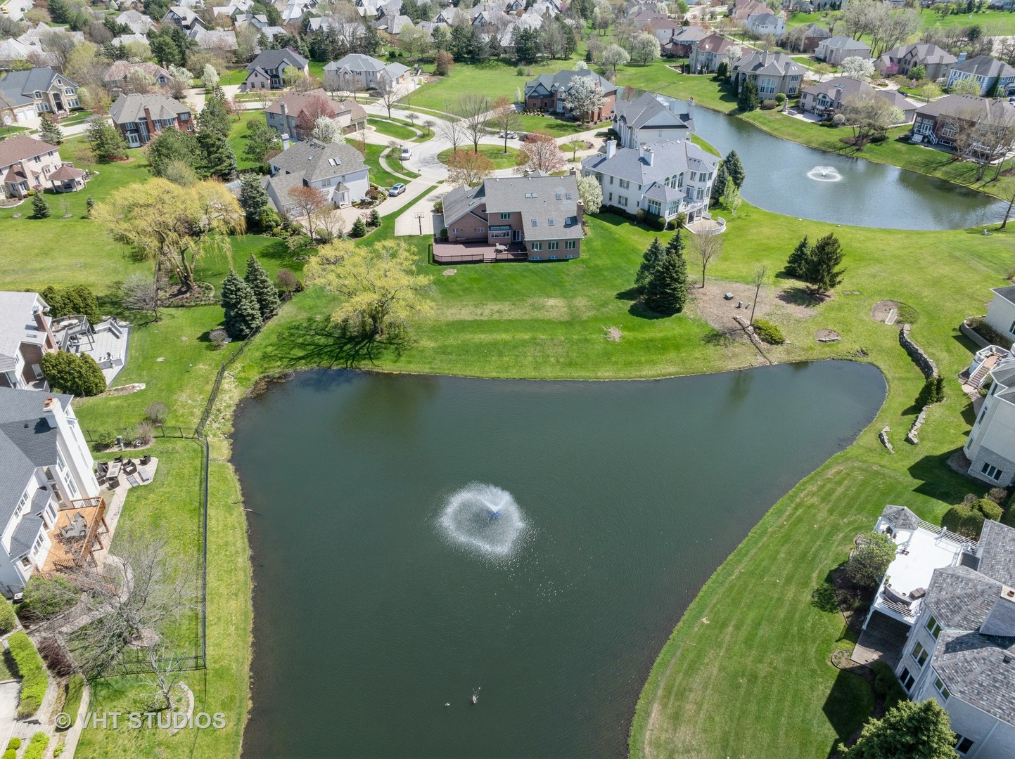 6705 Fieldstone Drive Burr Ridge, IL 60527 - Photo 7 of 41 an aerial view of a house with a lake view