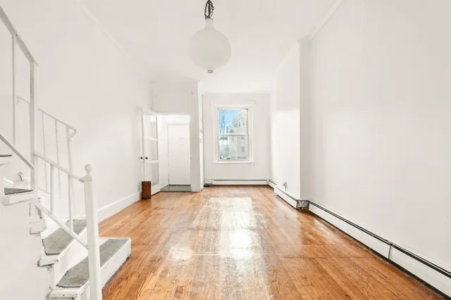 a view of an empty room and window