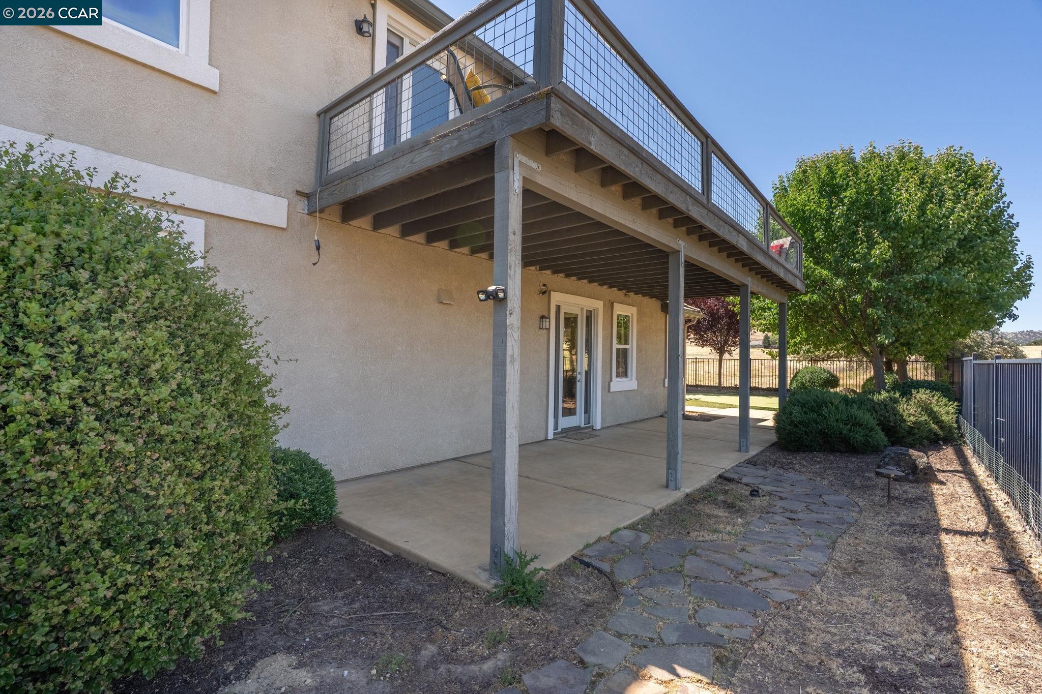 9028 Tee Court Patterson, CA 95363 - Photo 36 of 40 a view of a house with a yard