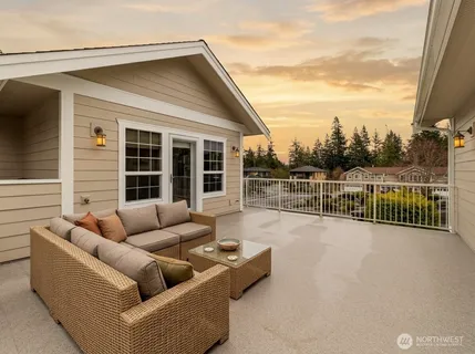 a view of a house with couches in front of house
