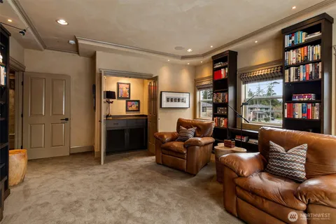 a kitchen with stainless steel appliances granite countertop a refrigerator a sink and a stove