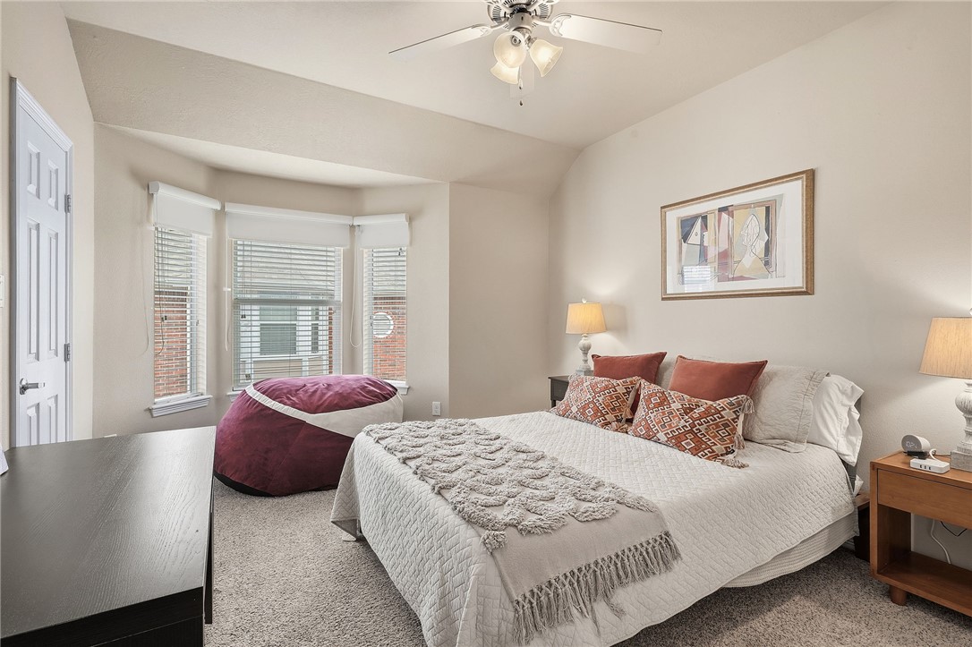 1198 Jones-Butler Road, Unit 2505 College Station, TX 77840 - Photo 9 of 13 a bedroom with bed and large window